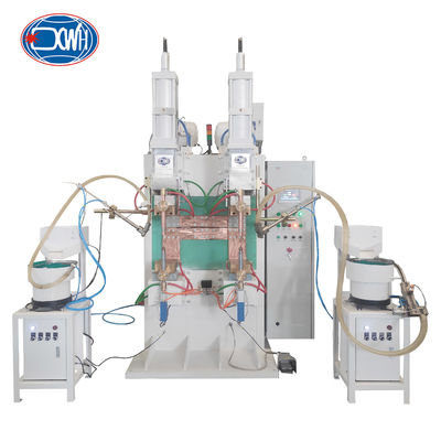 Un buon prezzo. Capacitive Discharge Nut Spot Welding Machine With Two Vibratory Bowl Feeder in linea